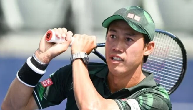 Kei Nishikori in action at the 2023 Atlanta Open, marking his resilient comeback.