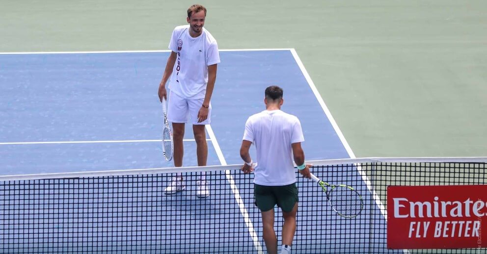 Alcaraz and Medvedev seen training together on the courts of the 2023 National Bank Open.