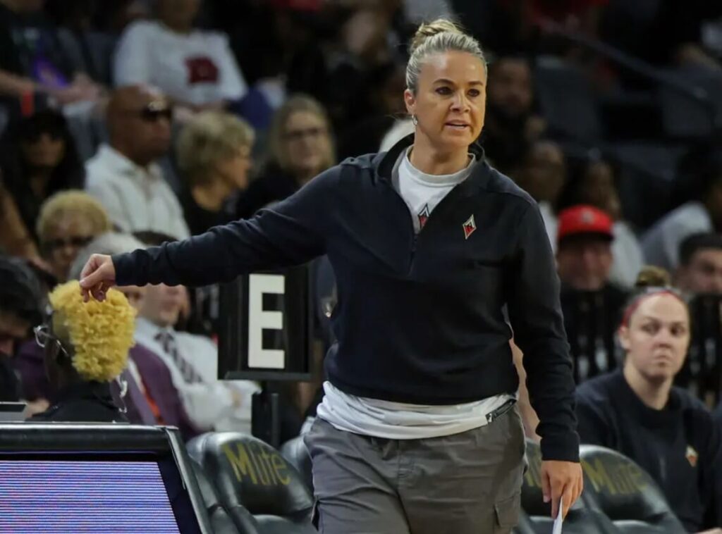 Close-up of Coach Becky Hammon during an intense game moment.