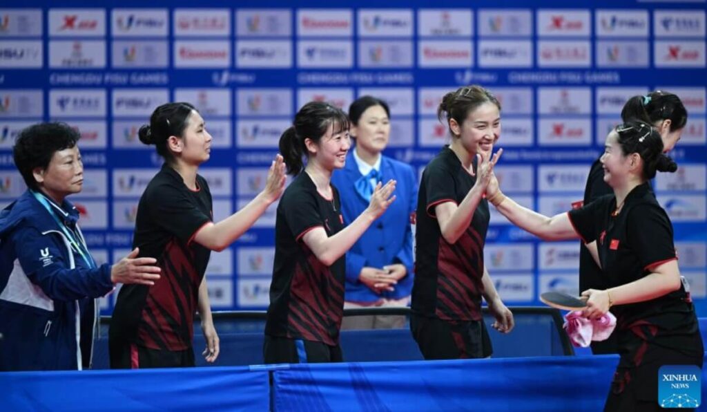 Celebrations ensue for China's gold-winning table tennis team.