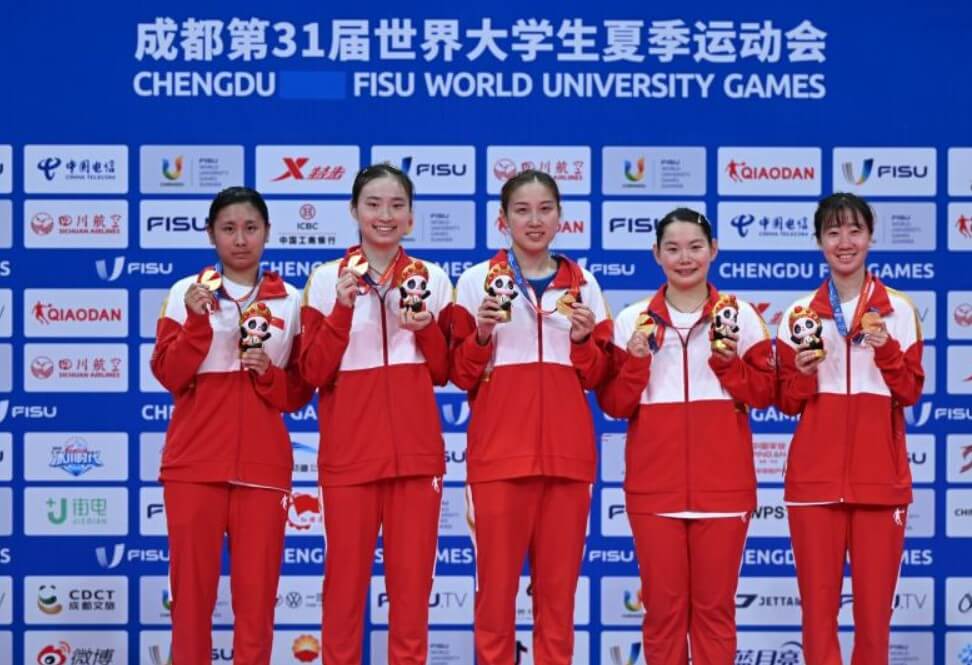 Members of the Chinese table tennis team, Yang Shilu, Wang Xiaotong, Qian Tianyi, He Zhuojia, and Zhao Shang (L to R), in high spirits during their gold medal celebration at the 31st FISU Summer World University Games in Chengdu.