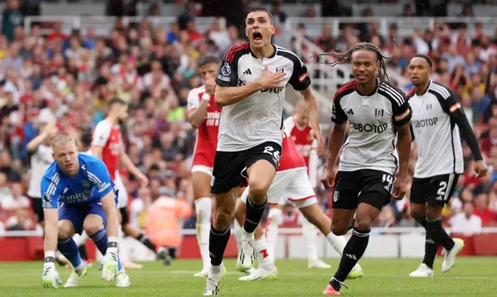 Joao Palhinha of Fulham rejoices upon netting the goal that leveled the score against Arsenal.