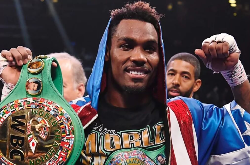 Jermell Charlo celebrating a victory inside the boxing ring.