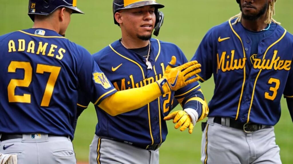 Milwaukee Brewers team members in action during a game.