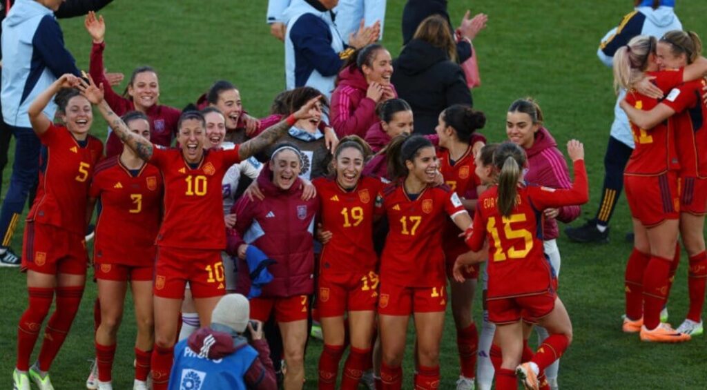 Spain's team rejoices as they advance to the World Cup semi-finals in Wellington.
