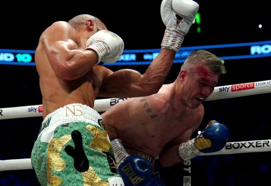 Eubank in action, delivering a powerful blow to Smith.