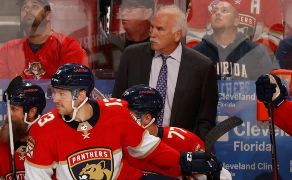 Joel Quenneville giving directives from the bench.