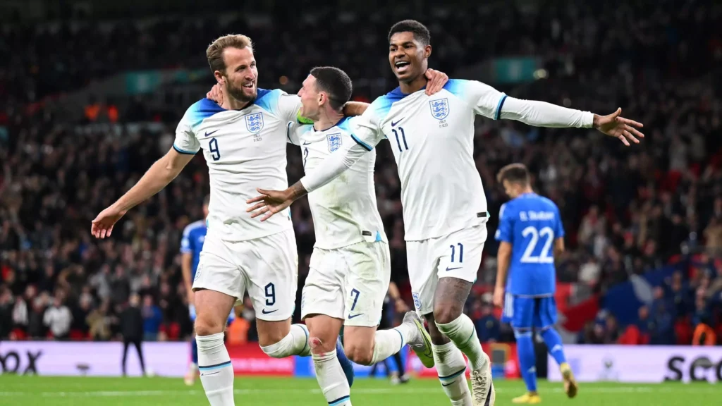 Harry Kane celebrates after scoring England's first goal against Italy.