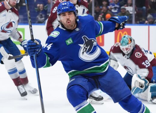 Sherwood’s Hat Trick Powers Canucks to Victory Over Avalanche